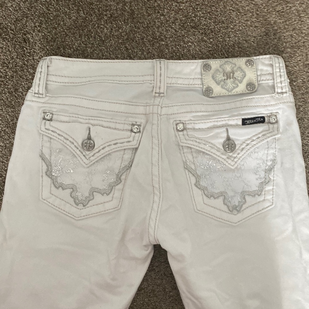 White Y2K Flare Miss Me Jeans with Butterfly design on back pockets